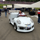 Illustration for article titled Porsche Uses The Best Golf Carts In The Universe